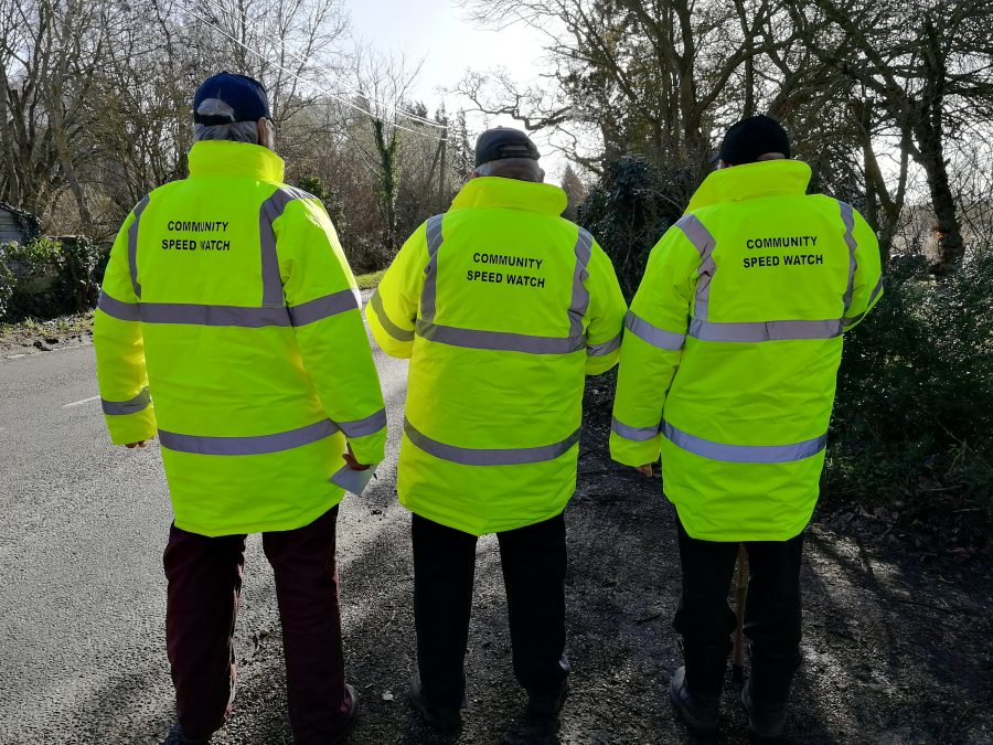 The photo shows 3 men that formed the community speed watch team.
