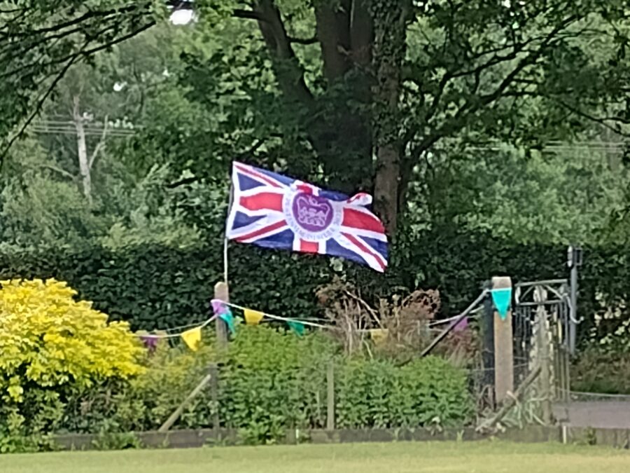 The picture shows the Union Jack at the Jubilee party at Woodbastwick Village Hall.